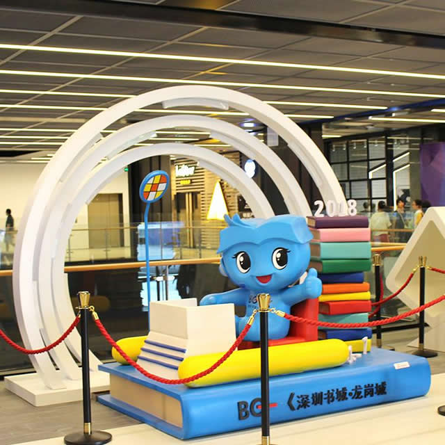 書城卡通藍精靈書本雕塑