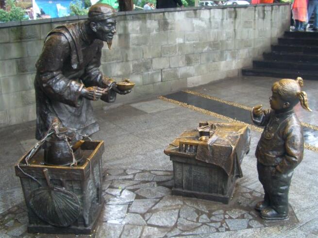 廣場(chǎng)商業(yè)街仿銅民俗玻璃鋼雕塑